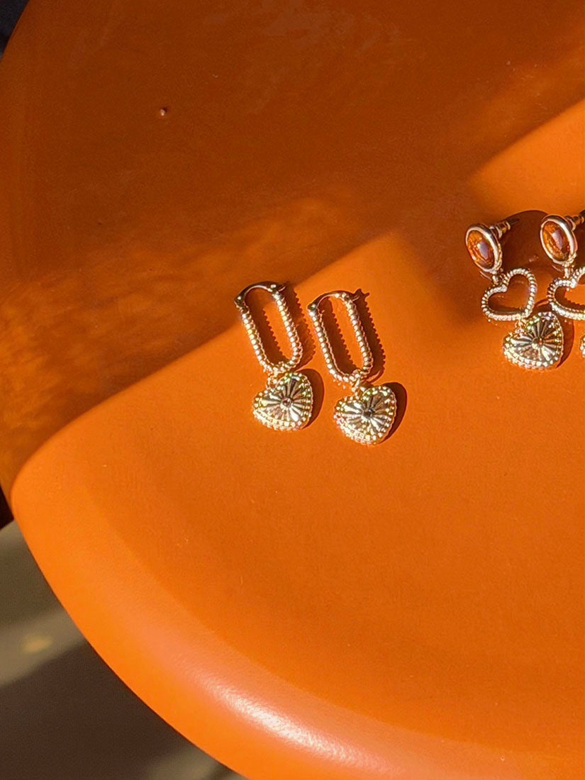 Twisted Earrings And Chiseled Heart